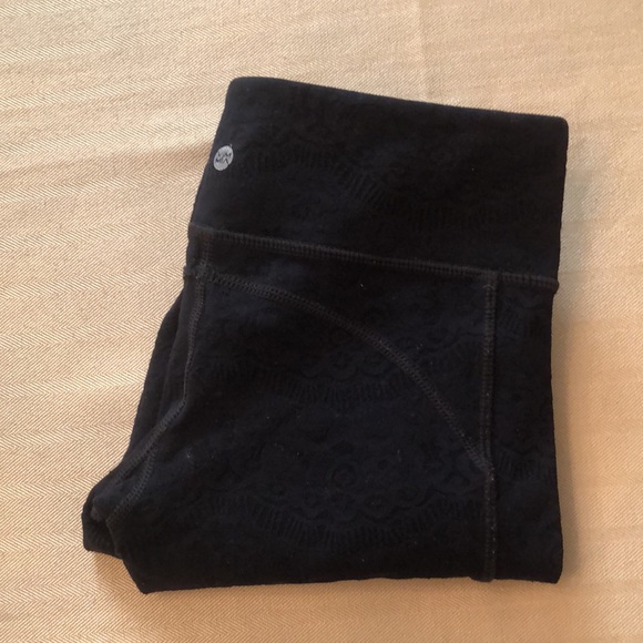 Vimmia Black texturized leggings; sheer on the sides; some pills along the seams - Picture 2 of 3